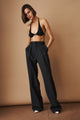 Women's black high-waisted pleated wide-leg pants with belt loops