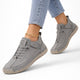 Women's lace-up low-top sneakers with round toe and flat sole