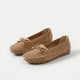 Women's perforated loafers with decorative bows and flat segmented soles