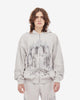Light coloured zip up hoodie with cathedral graphic print and hood