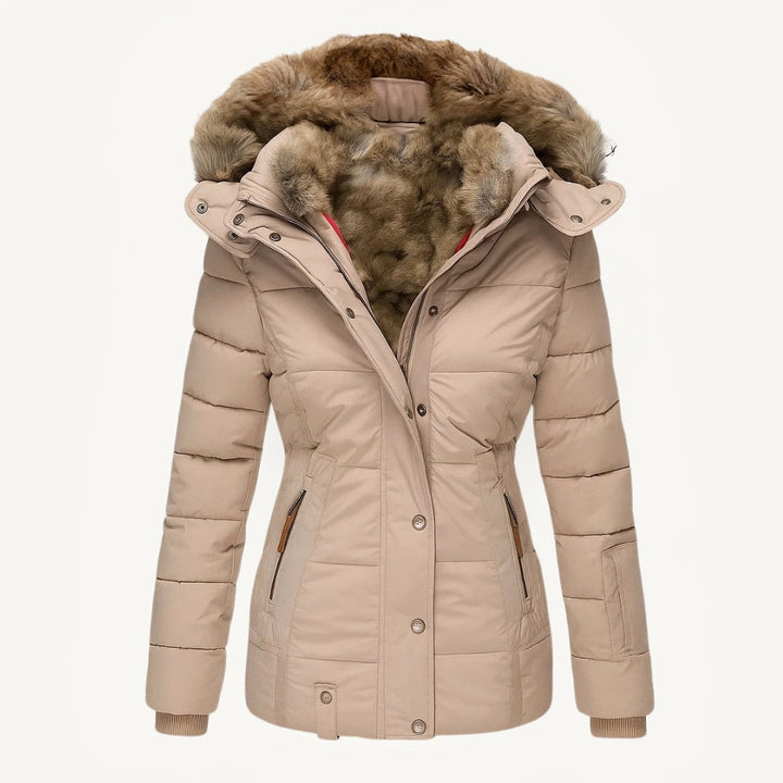 Women's hooded quilted winter coat with faux fur trim and zip pockets