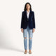 Women's navy velvet blazer with notched lapels and button front