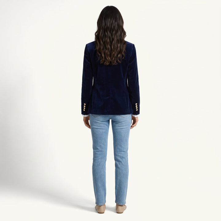 Women's navy velvet blazer with notched lapels and button front