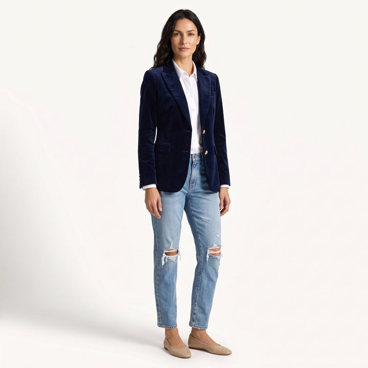 Women's navy velvet blazer with notched lapels and button front