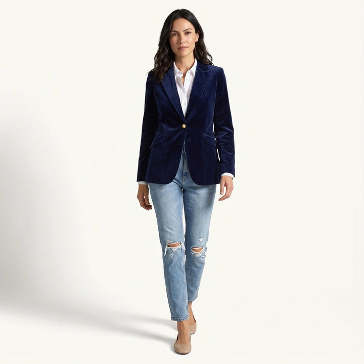 Women's navy velvet blazer with notched lapels and button front