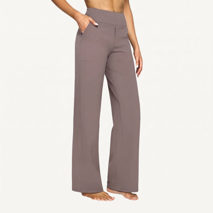 Women's high-waist wide leg trousers with side pockets and stitched leg details