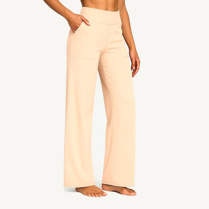 Women's high-waist wide leg trousers with side pockets and stitched leg details