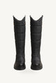 Knee-high quilted puffer boots with chunky lug soles