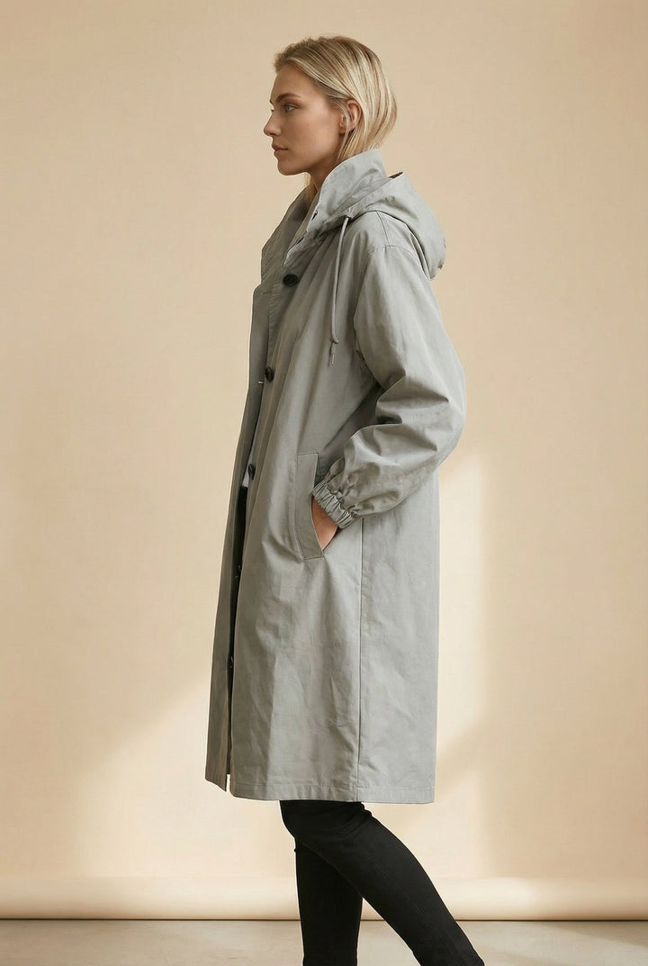 Women's hooded trench coat with buttons, long sleeves and side pockets