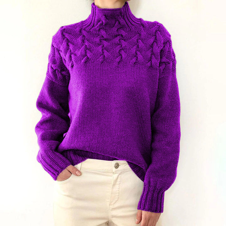 Women's cable knit turtleneck sweater with long sleeves and ribbed trims