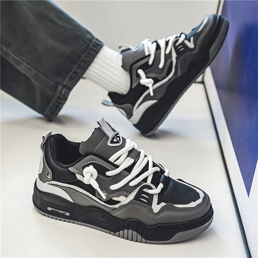 Modern layered lace-up sneakers with contrasting panels and chunky soles