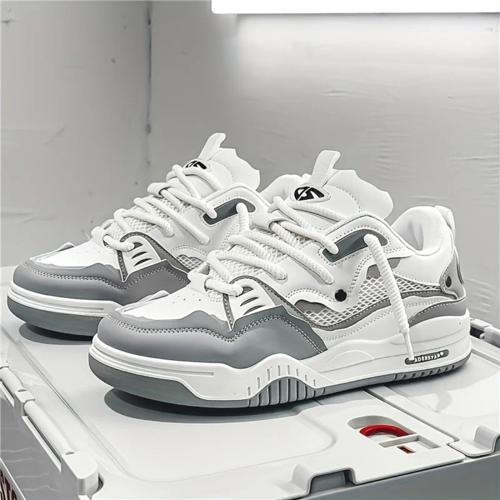 Modern layered lace-up sneakers with contrasting panels and chunky soles