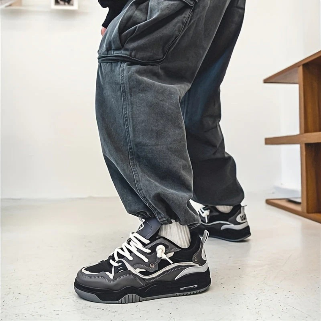 Modern layered lace-up sneakers with contrasting panels and chunky soles