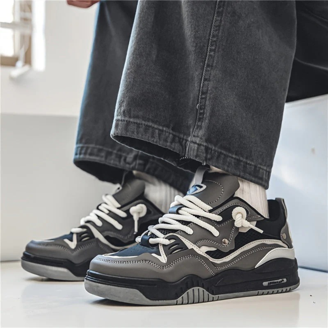 Modern layered lace-up sneakers with contrasting panels and chunky soles