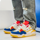 Modern layered lace-up sneakers with contrasting panels and chunky soles
