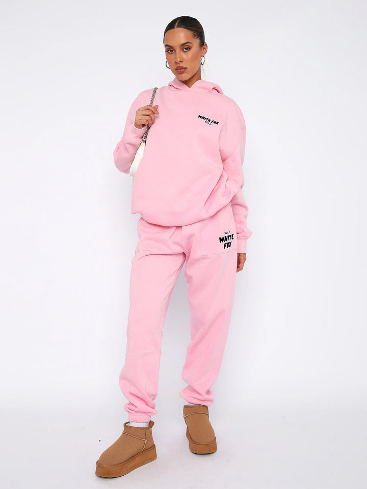 Women's hoodie and jogger tracksuit set with hood and pockets