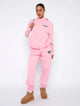 Women's hoodie and jogger tracksuit set with hood and pockets