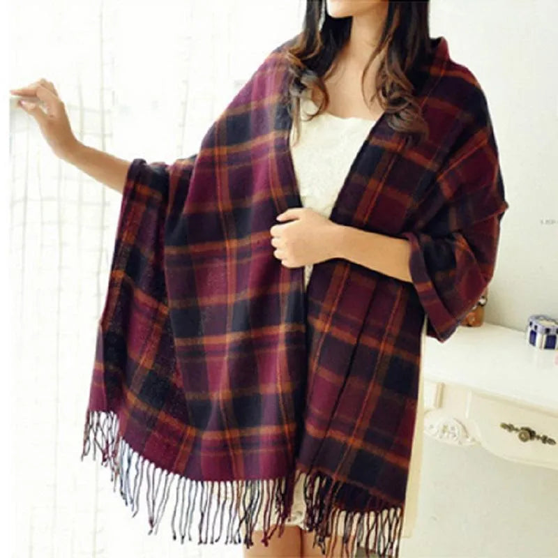 Oversized fringed scarf shown draped around the neck in checked and plain variations