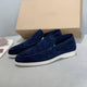 Slip-on loafers with moc-toe stitching and flat contrasting soles
