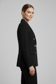 Women's double-breasted blazer with notched lapels and gold-tone buttons