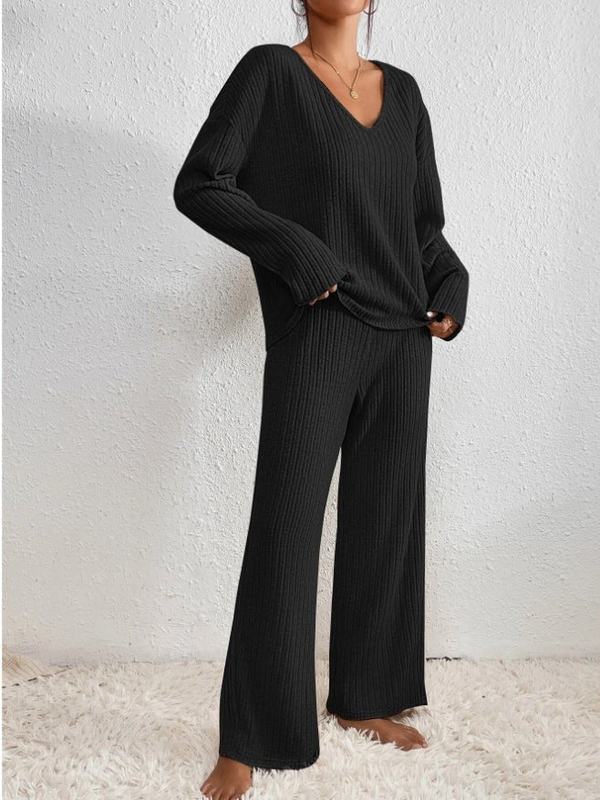 Women's ribbed knit loungewear set with V-neck top and wide-leg trousers