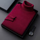 Plain ribbed turtleneck sweater folded in a presentation box