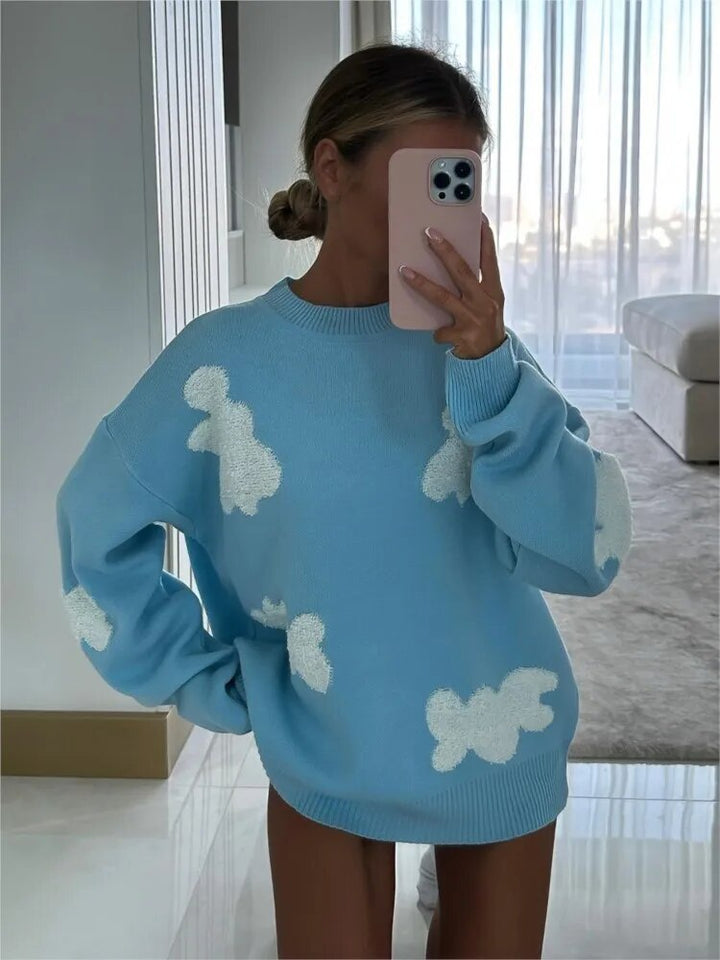 Women's patterned knit sweater with crew neck, long sleeves and contrasting motifs