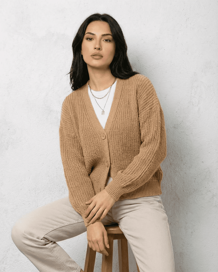 Women's yellow knit cardigan with long sleeves