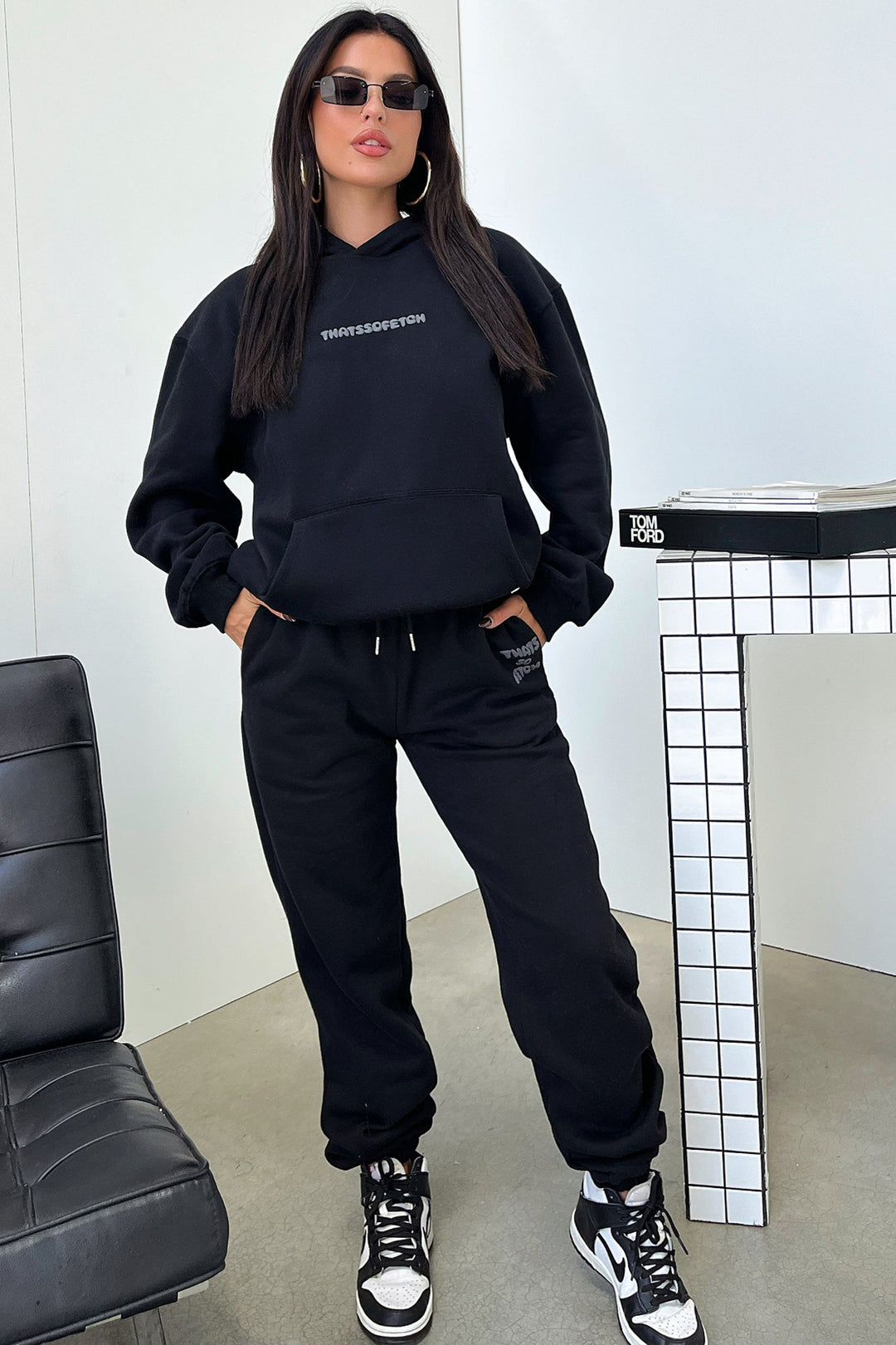 Women's black hoodie with hood and contrasting back graphic