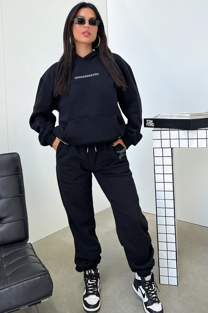 Women's black hoodie with hood and contrasting back graphic