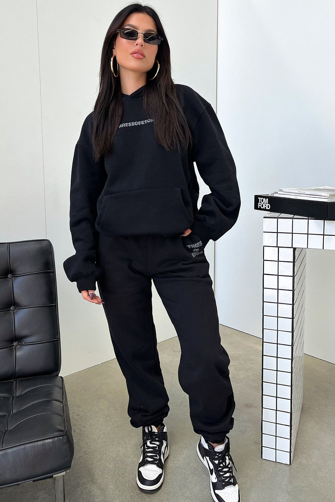 Women's black hoodie with hood and contrasting back graphic