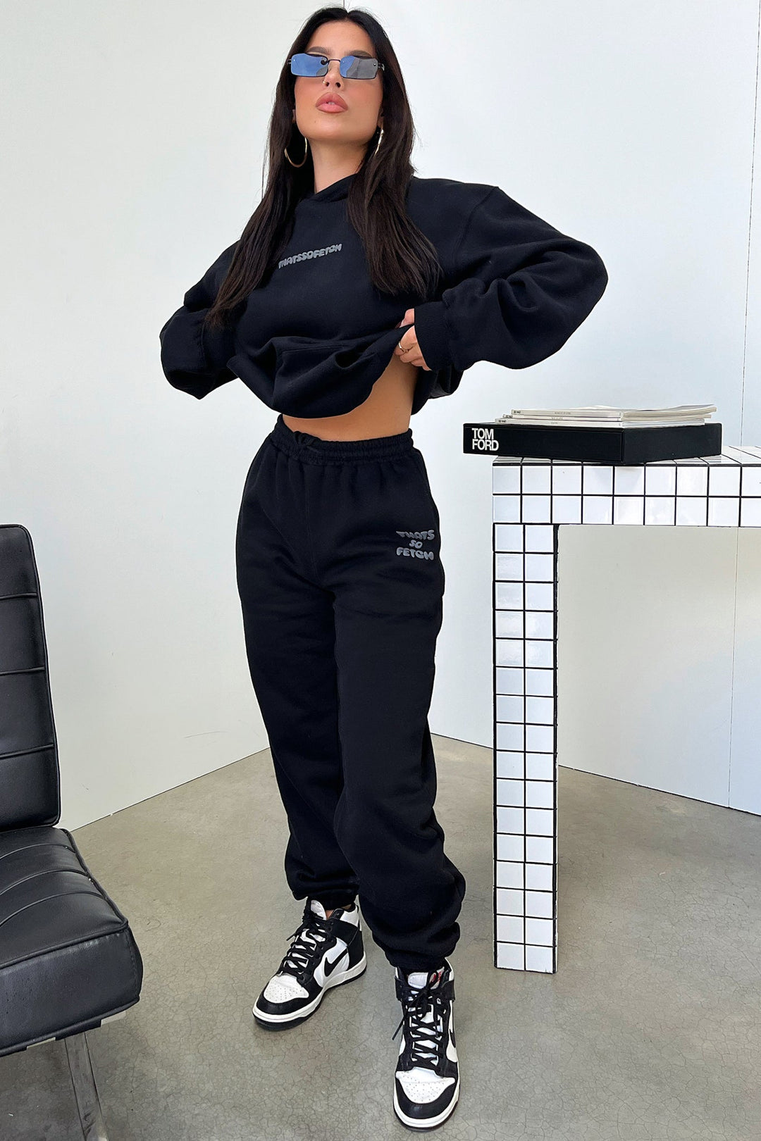 Women's black hoodie with hood and contrasting back graphic