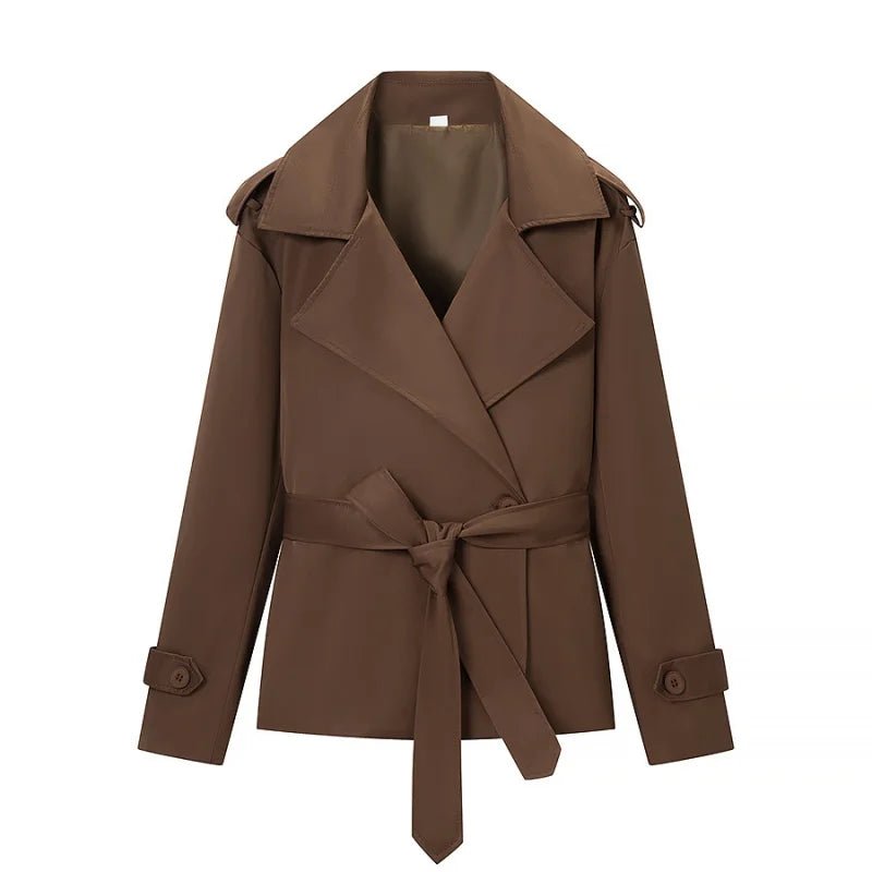 Women's brown cropped trench coat with wide lapels and belt