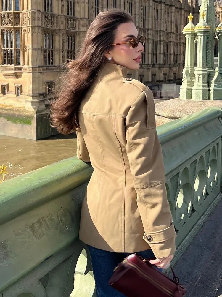 Women's beige fitted utility jacket with high collar and flap pockets