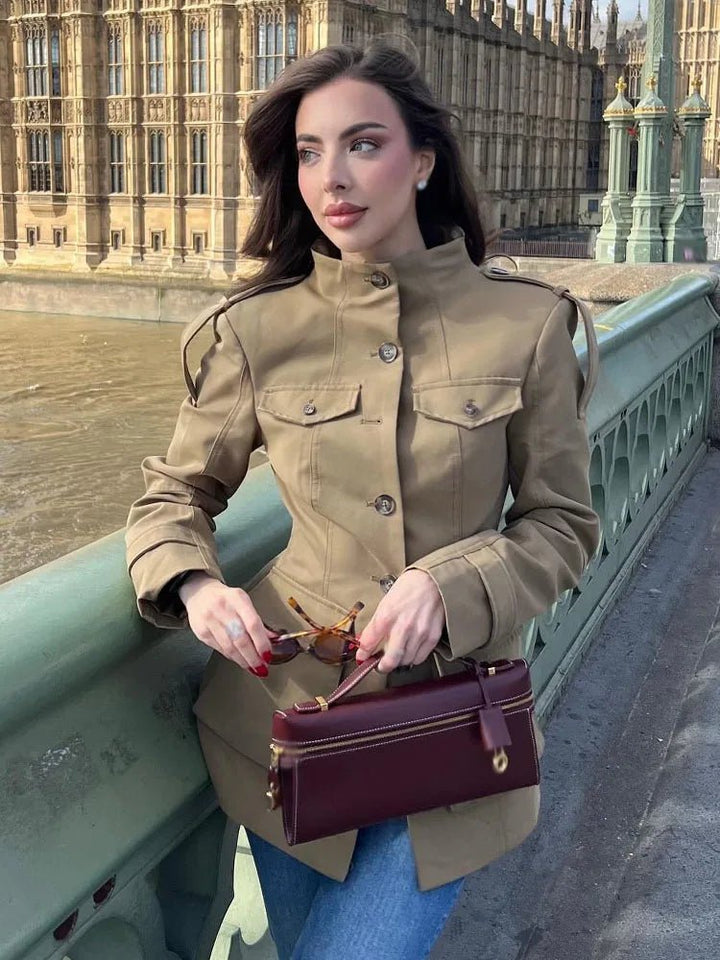 Women's beige fitted utility jacket with high collar and flap pockets