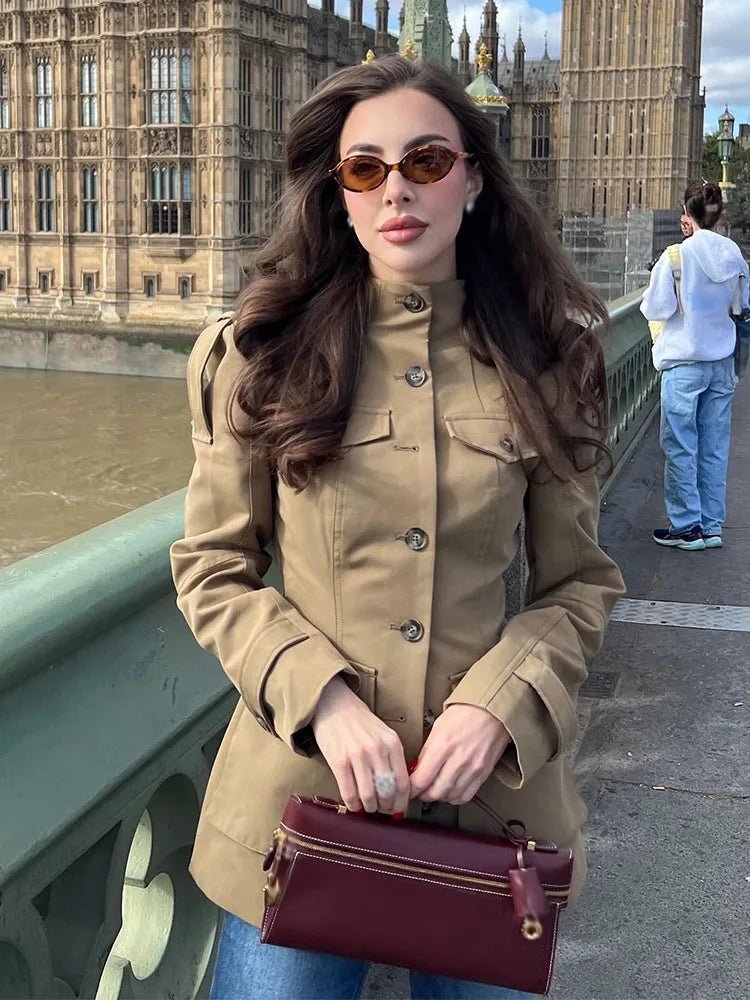 Women's beige fitted utility jacket with high collar and flap pockets