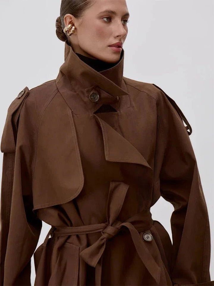 Women's belted short trench coat with stand collar, long sleeves and double-breasted buttons