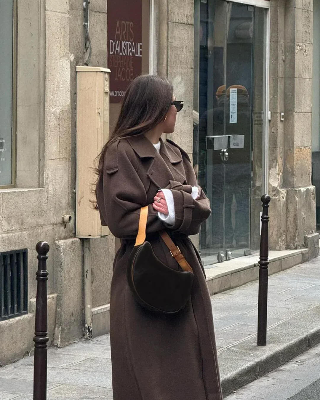 Women's long wrap coat with notch lapels and waist belt