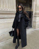 Women's long wrap coat with notch lapels and waist belt