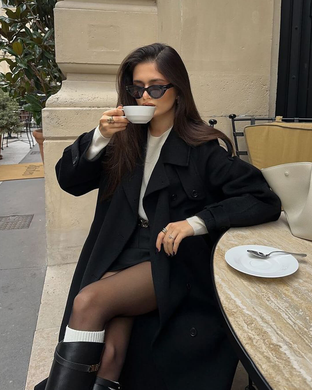 Women's long wrap coat with notch lapels and waist belt
