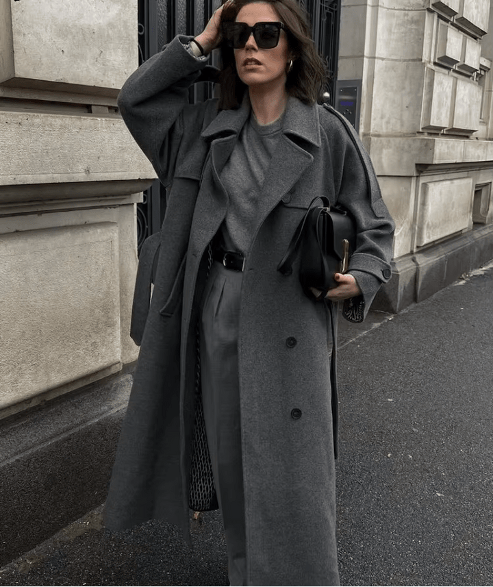 Women's long wrap coat with notch lapels and waist belt