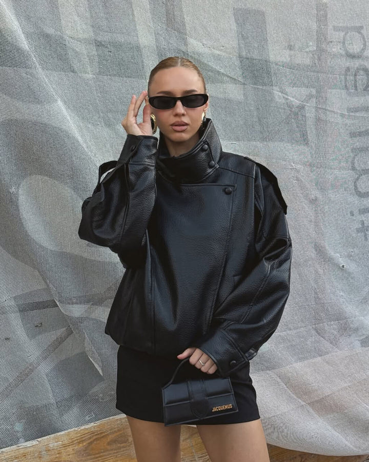 Women's asymmetrical jacket with high collar and long sleeves