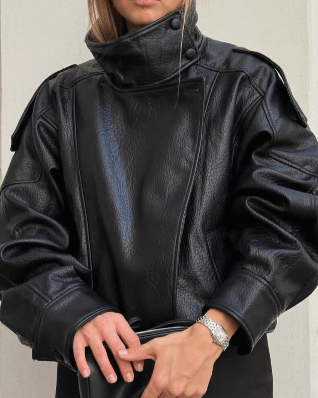 Women's asymmetrical jacket with high collar and long sleeves