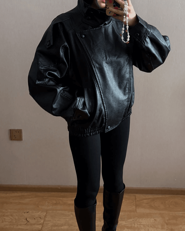 Women's asymmetrical jacket with high collar and long sleeves