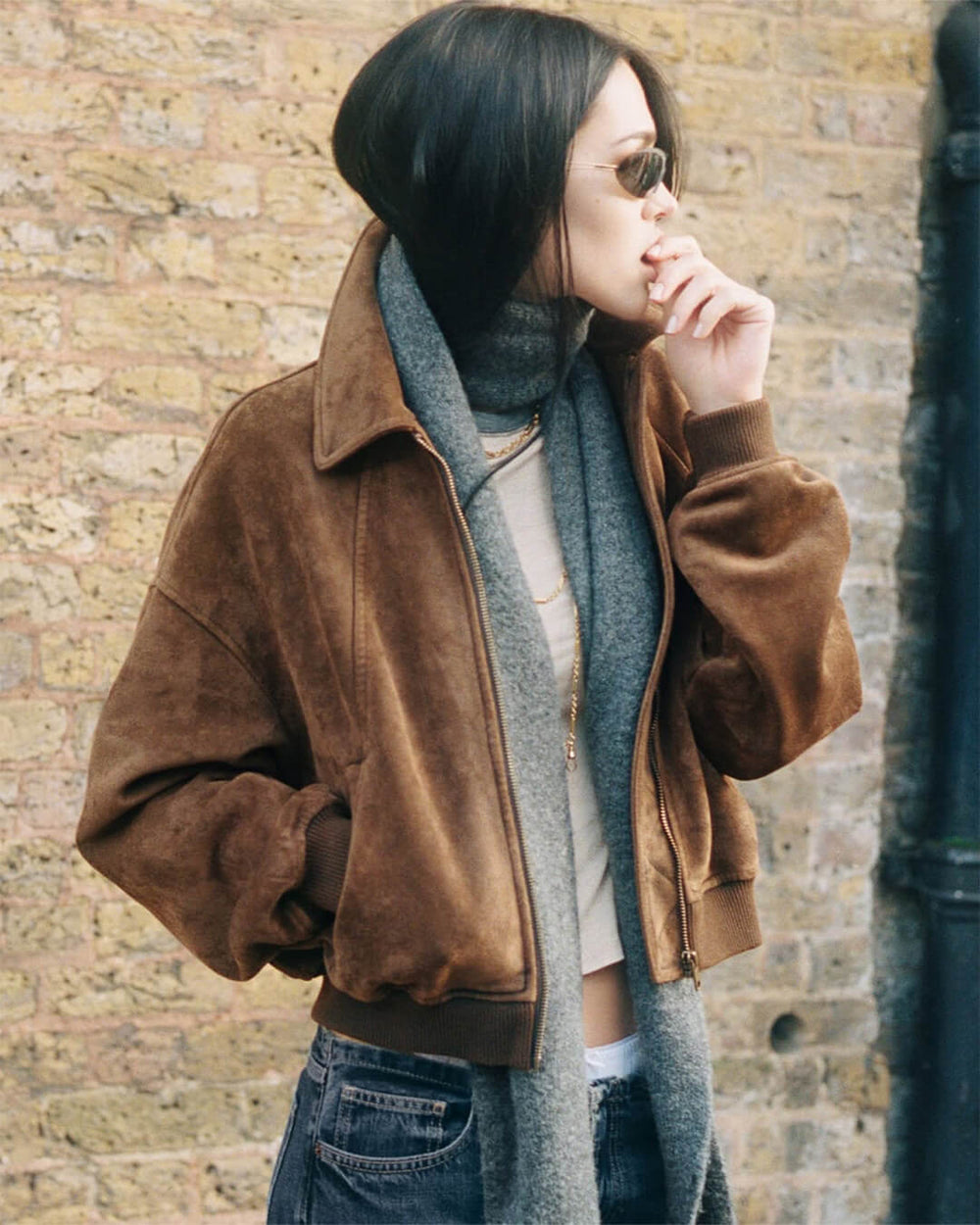 Women's brown faux suede bomber jacket with zip front and ribbed trims
