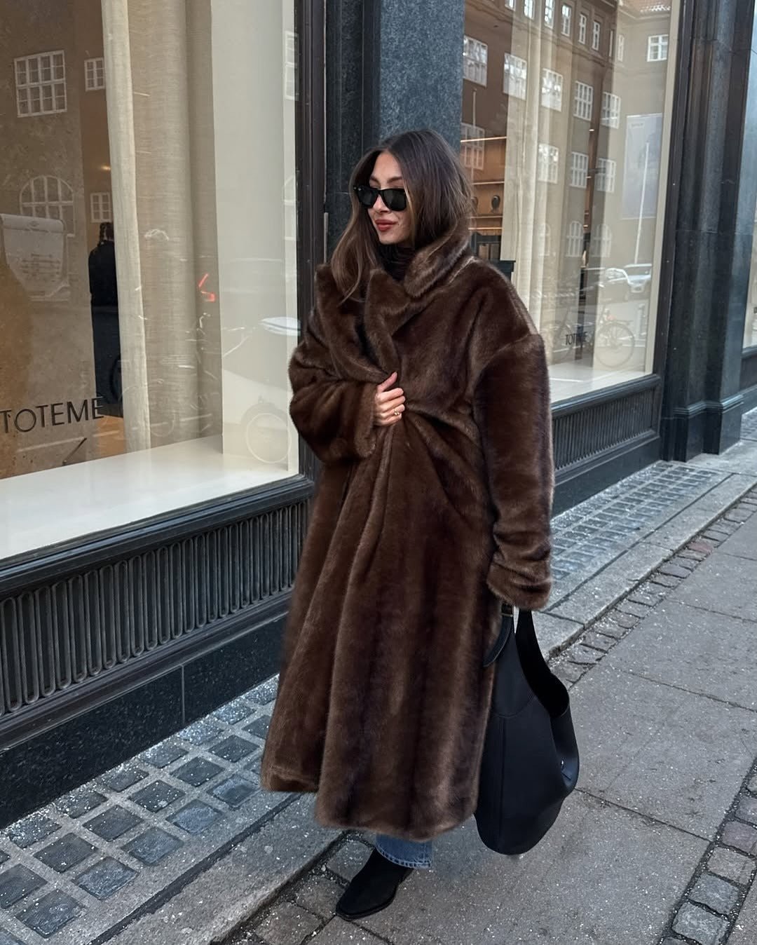 Women's brown faux-fur maxi coat with wide collar