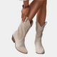 Women's perforated ankle boots with pointed toes and block heels