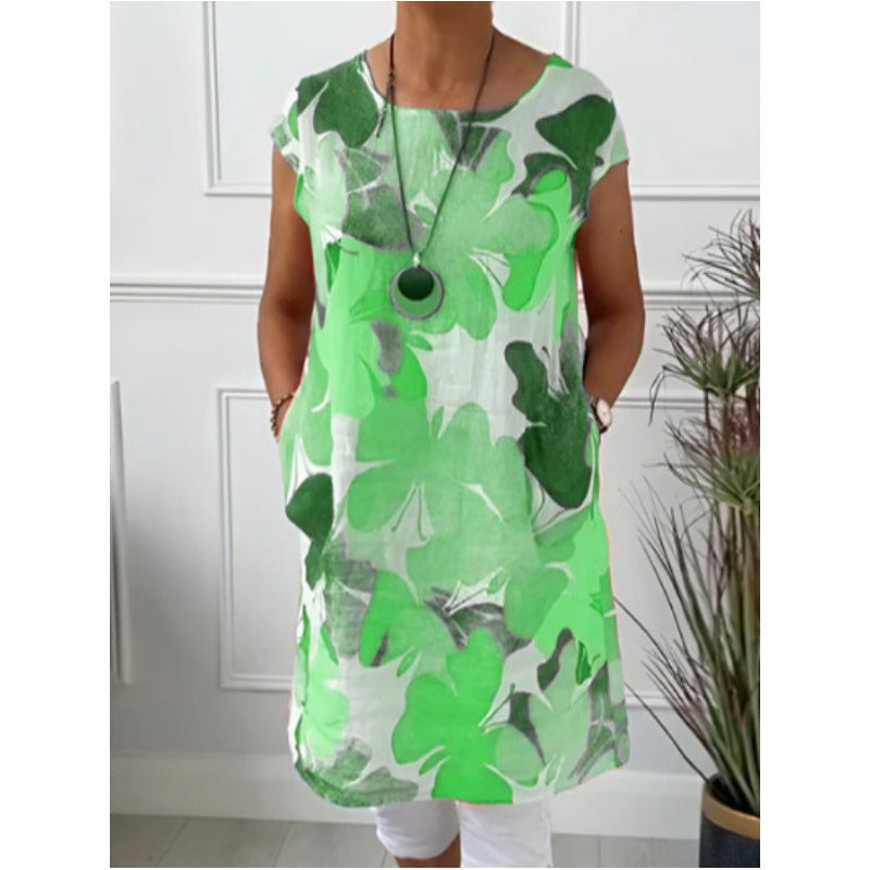 Women's floral print shift dress with short sleeves, crew neck and mid-calf hem