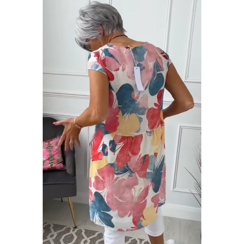 Women's floral print shift dress with short sleeves, crew neck and mid-calf hem