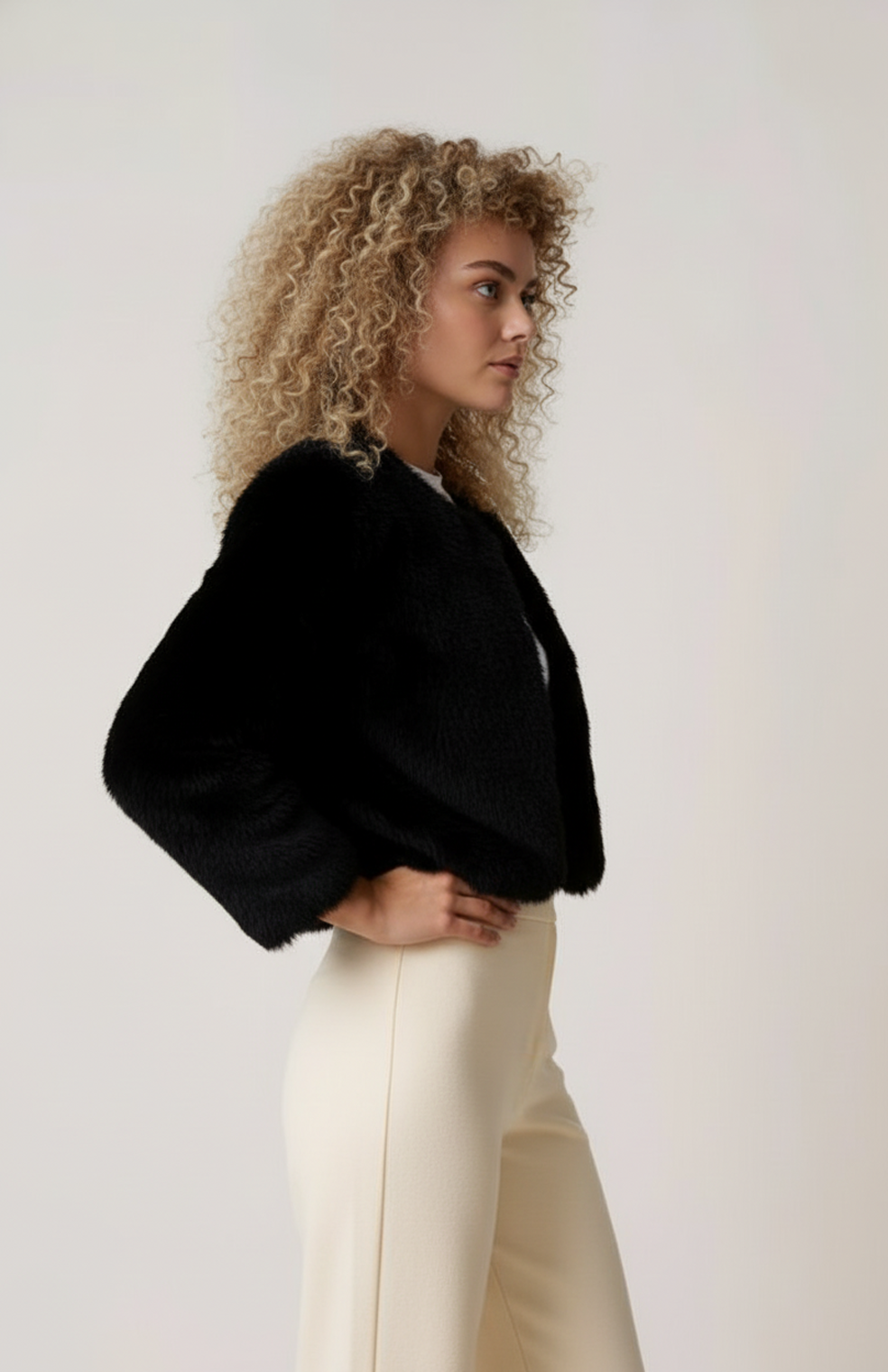 Women's short plush-textured jacket with long sleeves and open front